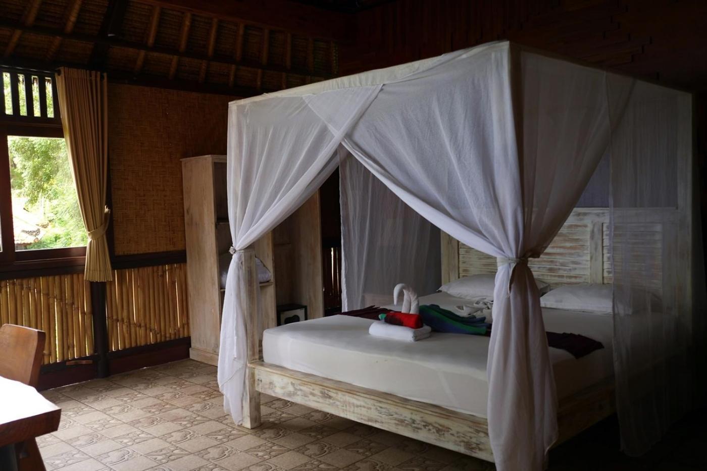 Alam Mimpi Bali Hotel เตจากูลา ภายนอก รูปภาพ