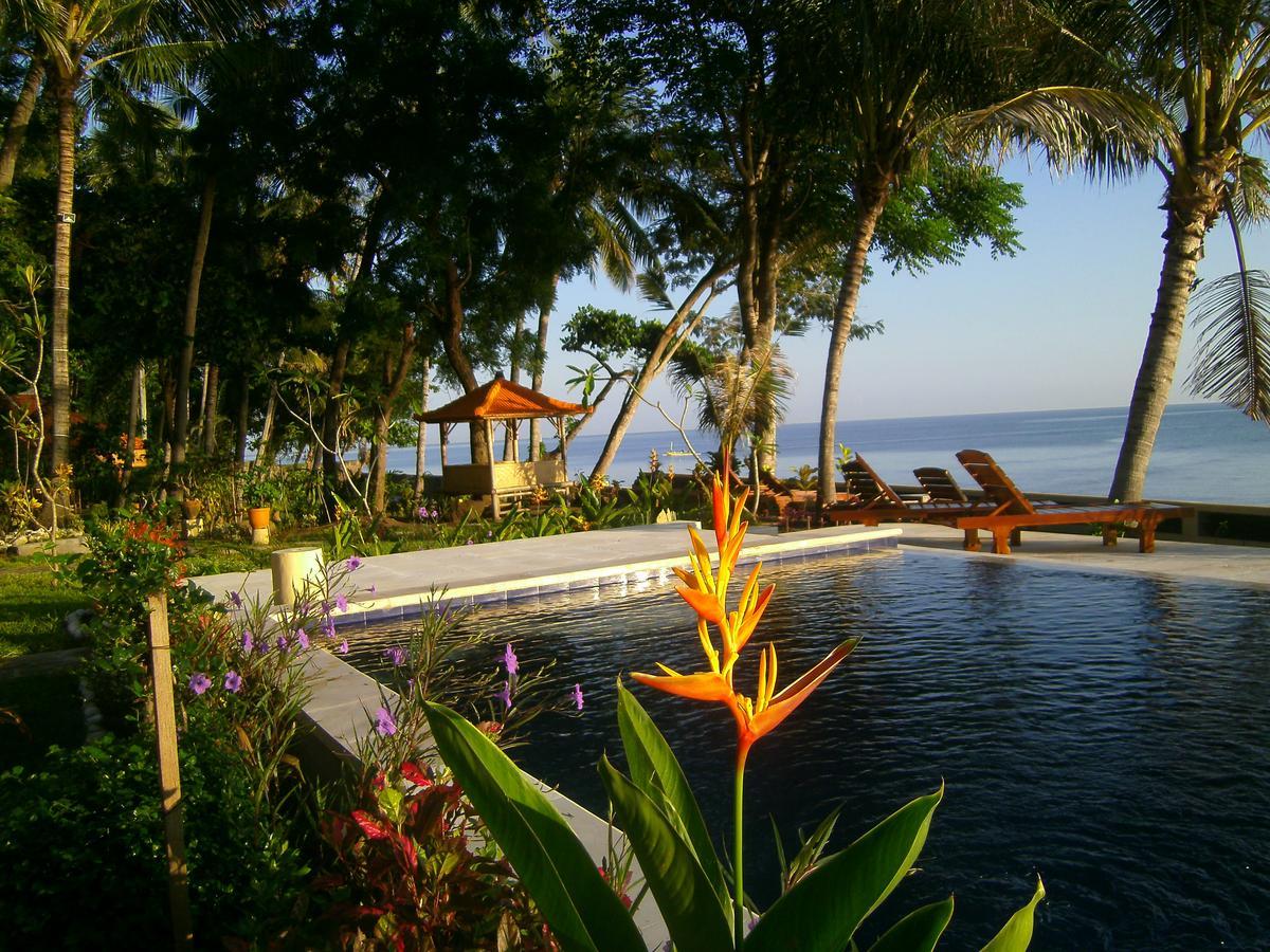 Alam Mimpi Bali Hotel เตจากูลา ภายนอก รูปภาพ