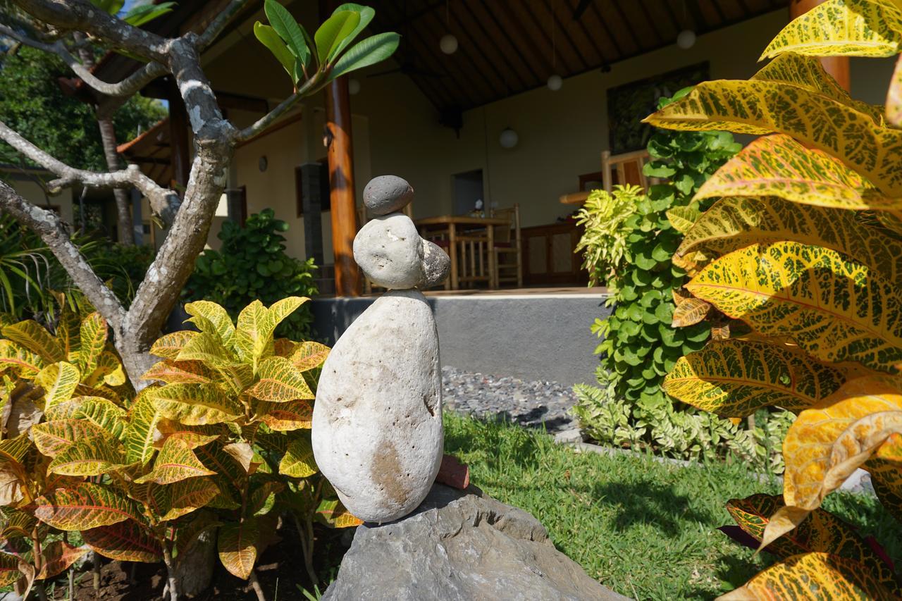 Alam Mimpi Bali Hotel เตจากูลา ภายนอก รูปภาพ