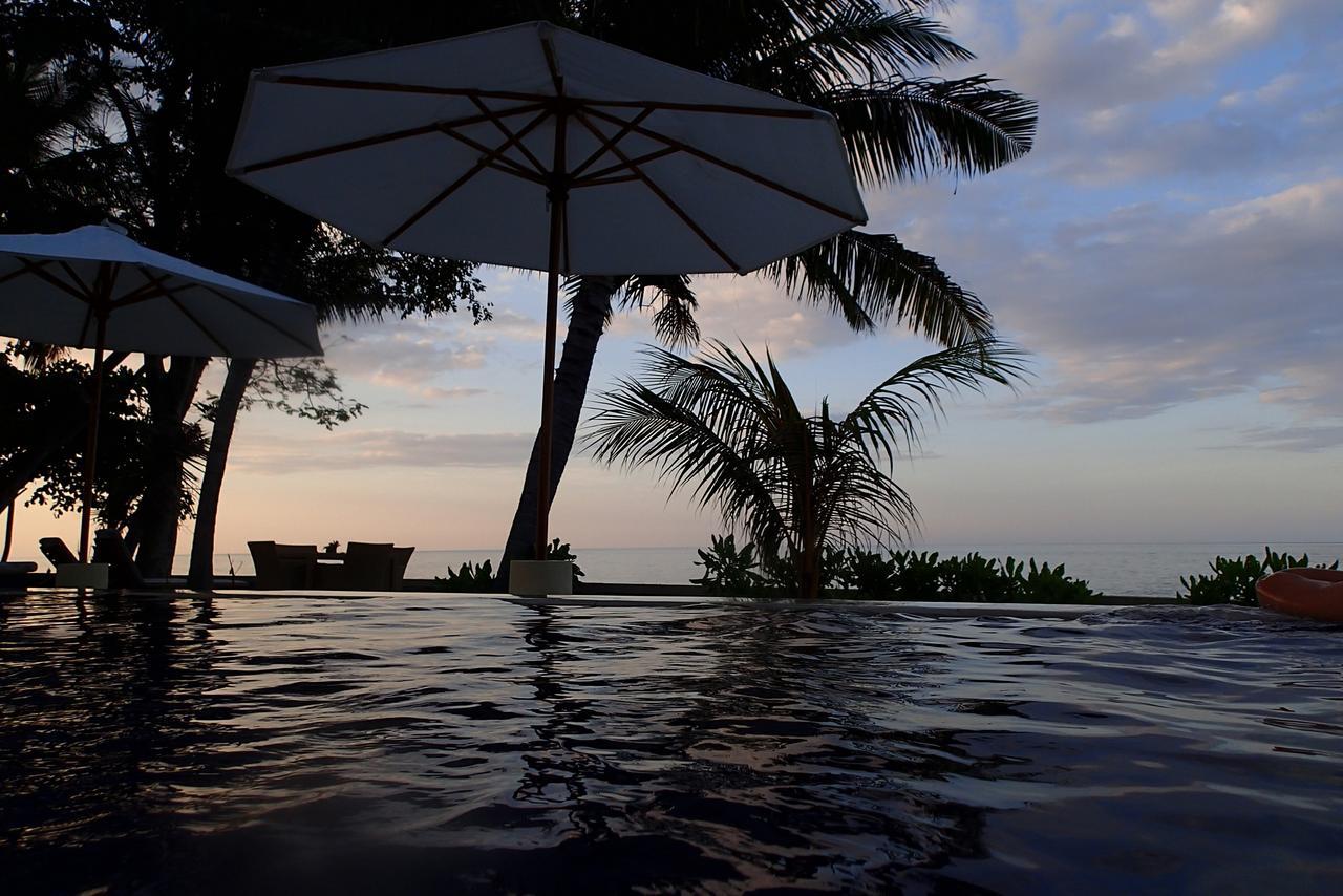 Alam Mimpi Bali Hotel เตจากูลา ภายนอก รูปภาพ