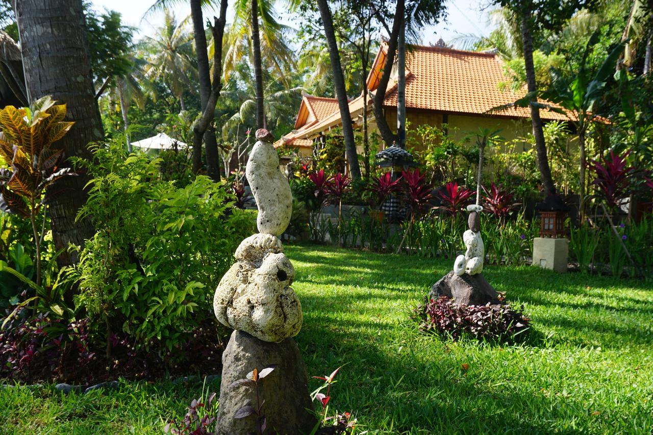 Alam Mimpi Bali Hotel เตจากูลา ภายนอก รูปภาพ