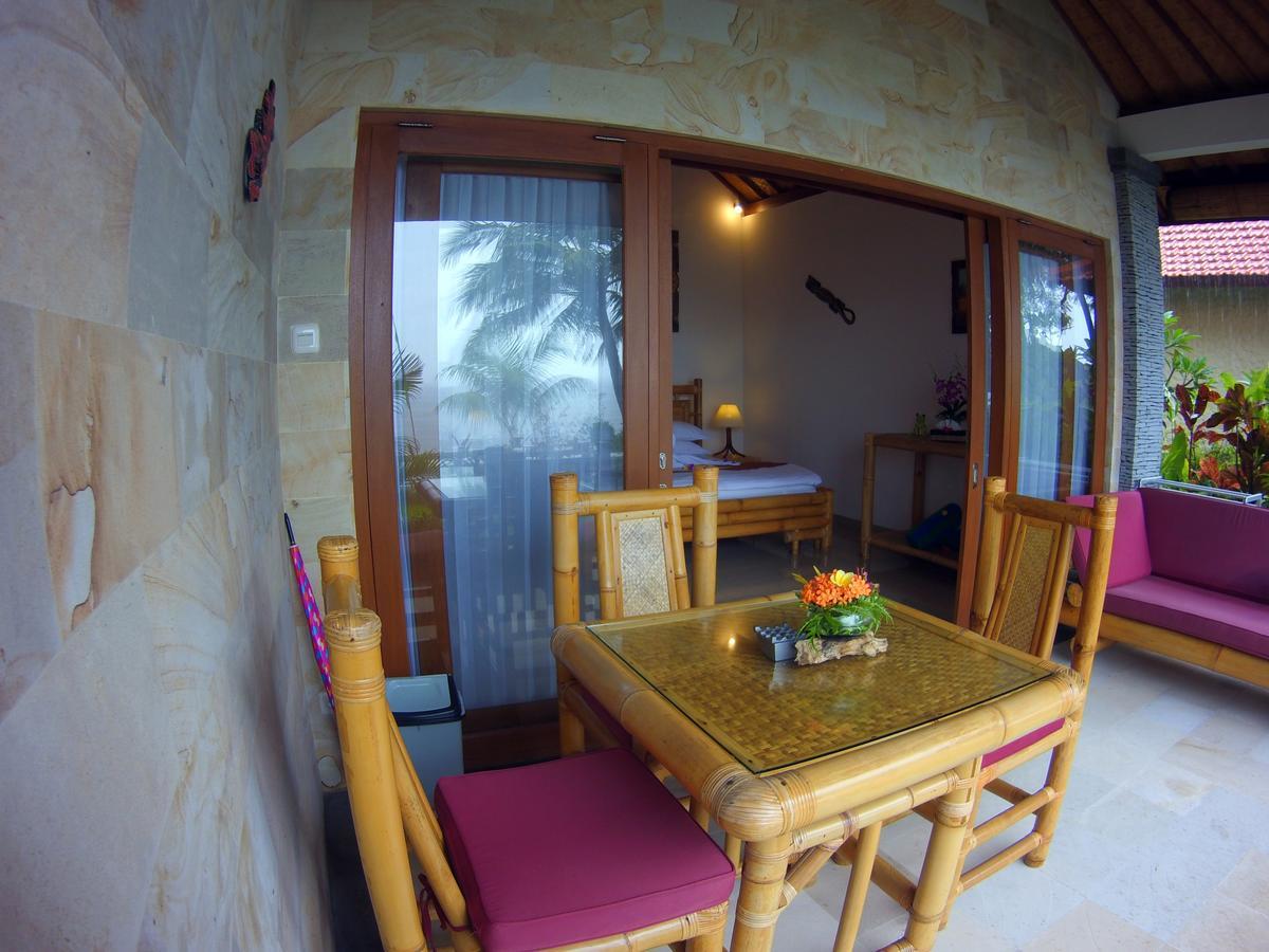 Alam Mimpi Bali Hotel เตจากูลา ภายนอก รูปภาพ
