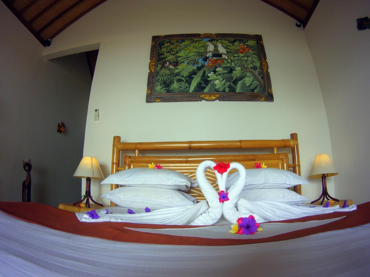 Alam Mimpi Bali Hotel เตจากูลา ภายนอก รูปภาพ