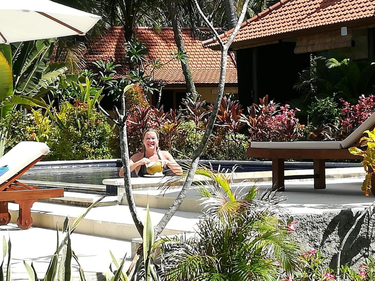 Alam Mimpi Bali Hotel เตจากูลา ภายนอก รูปภาพ