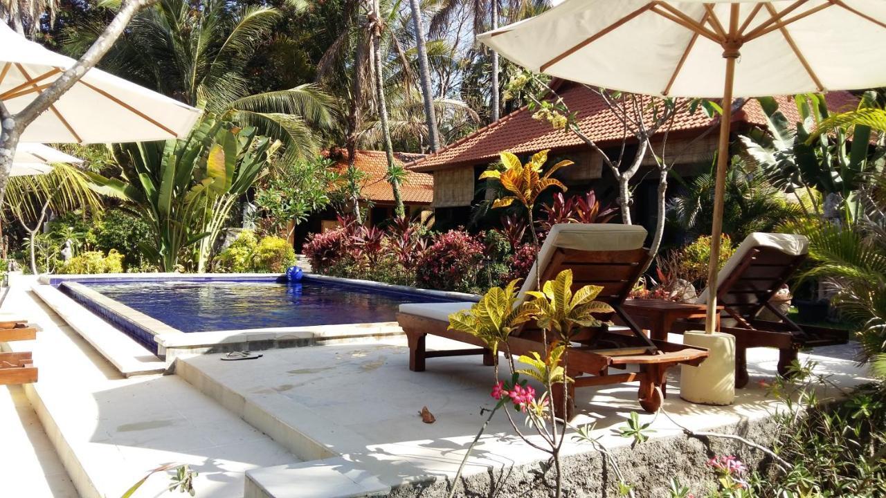 Alam Mimpi Bali Hotel เตจากูลา ภายนอก รูปภาพ