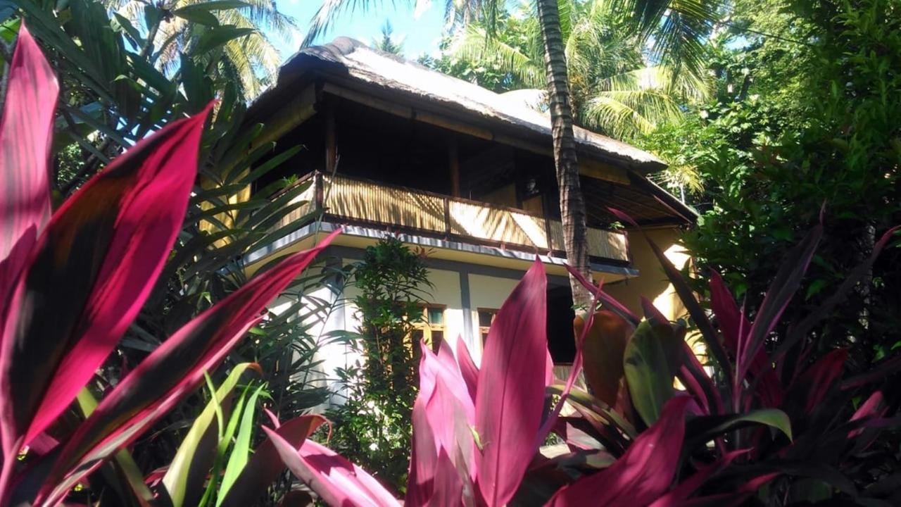 Alam Mimpi Bali Hotel เตจากูลา ภายนอก รูปภาพ