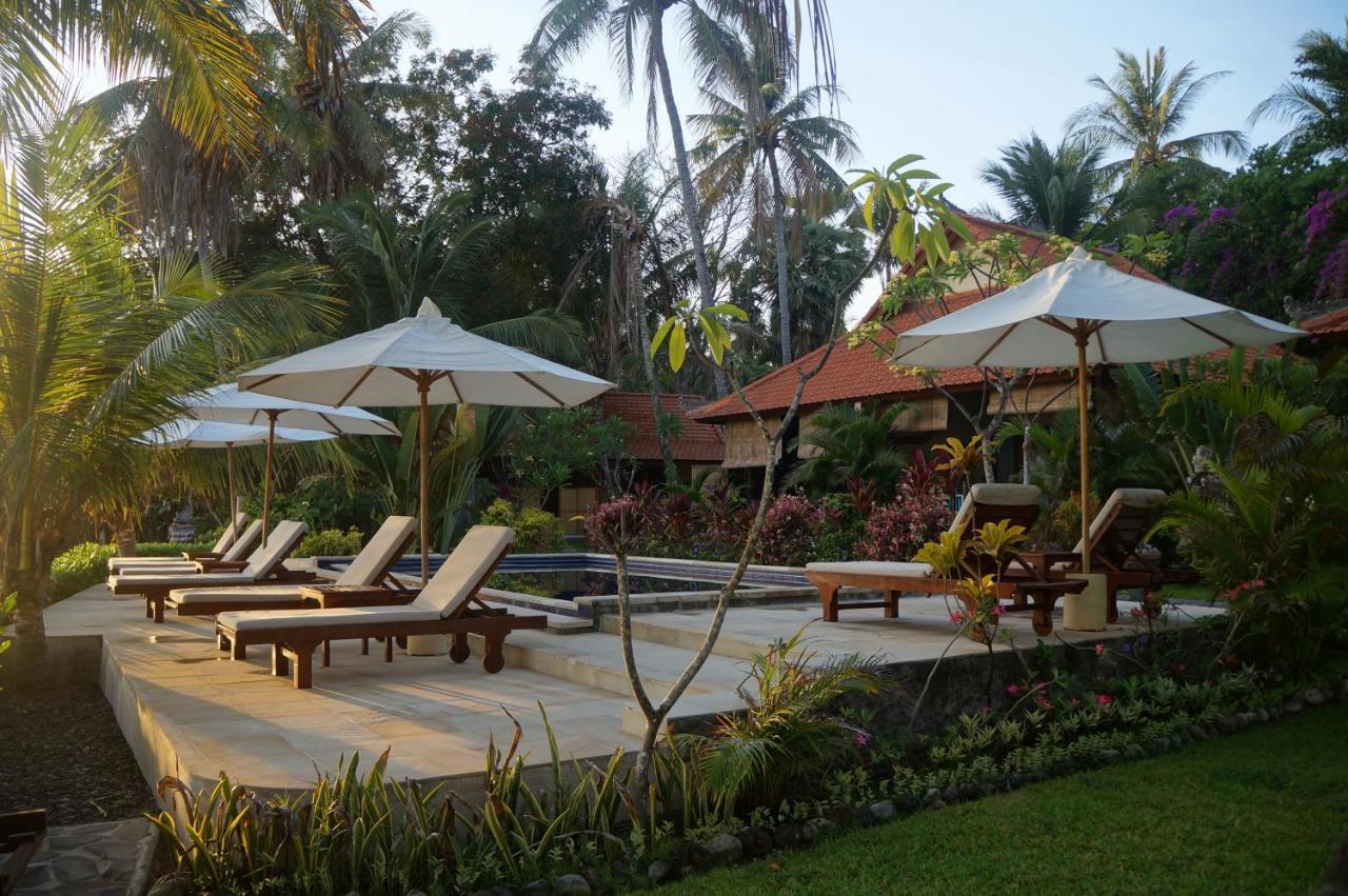 Alam Mimpi Bali Hotel เตจากูลา ภายนอก รูปภาพ