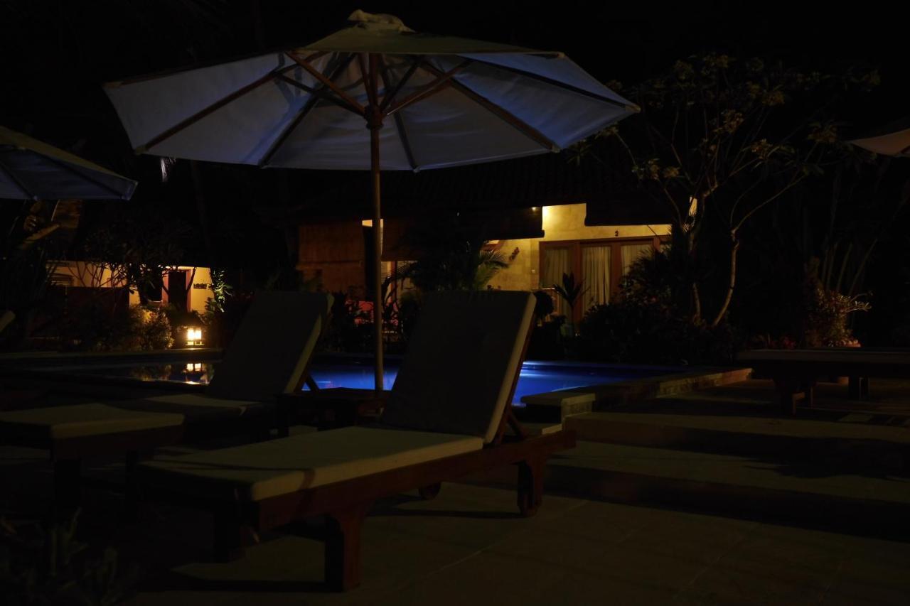 Alam Mimpi Bali Hotel เตจากูลา ภายนอก รูปภาพ